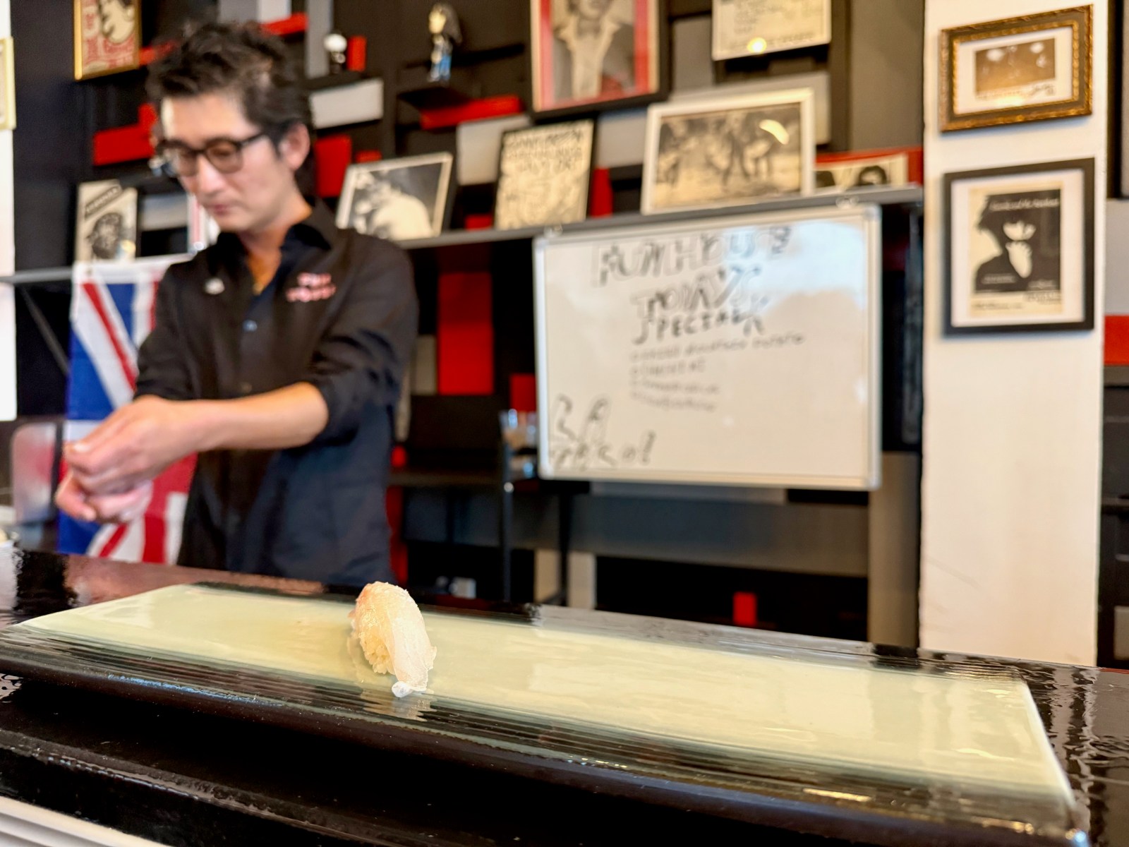 Chef and guitarist Tsubasa Muratani working behind the Funhouse counter